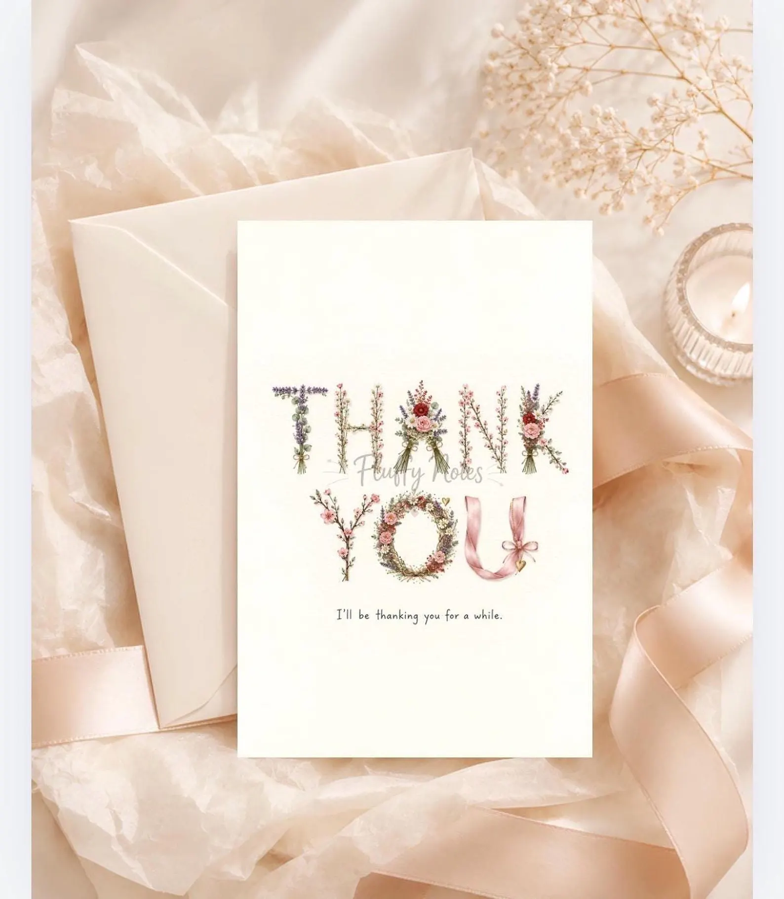Floral thank-you card with watercolor flowers forming the lettering